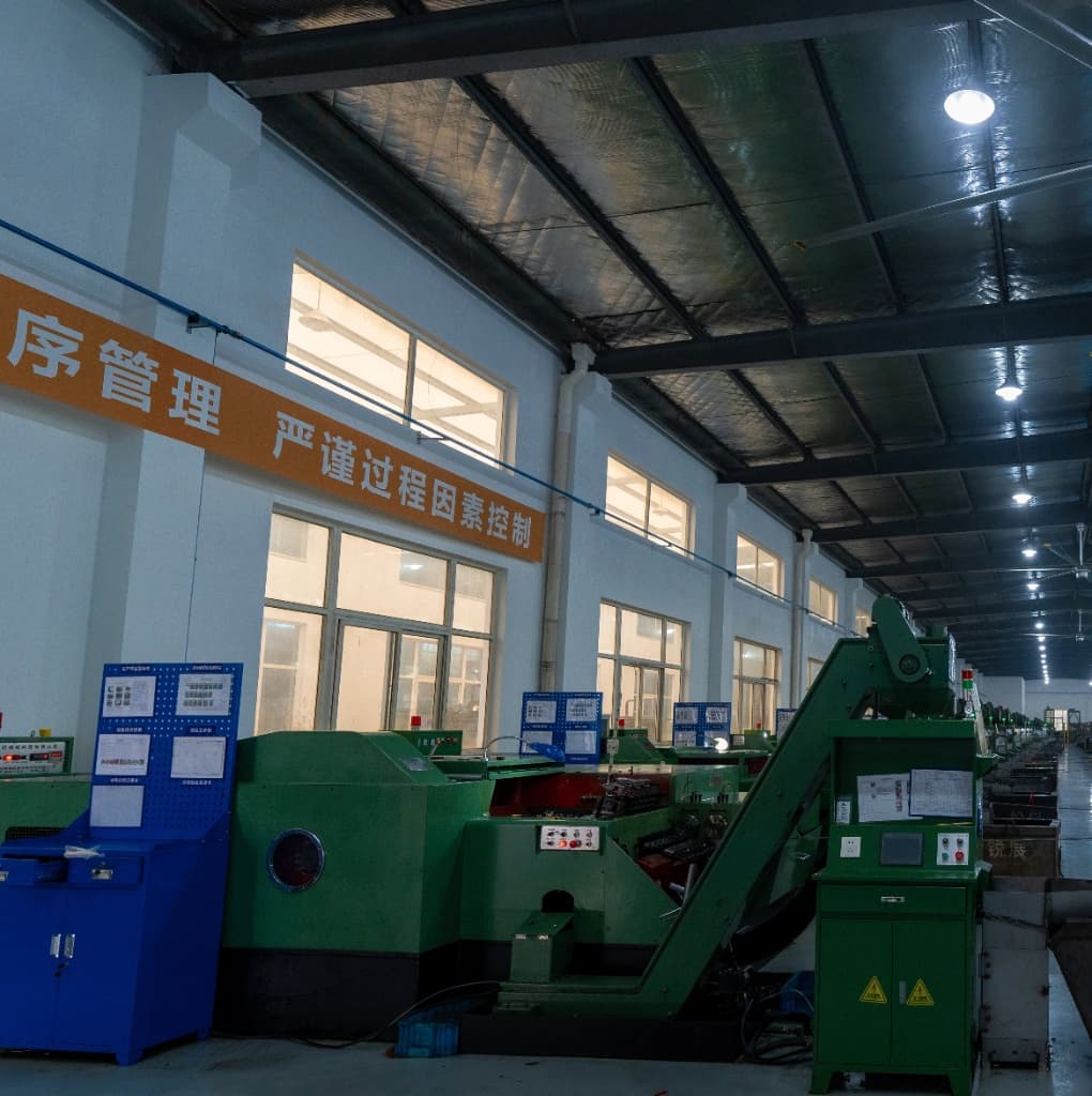 Fastener manufacturing facility with corrosion-resistant coating capabilities